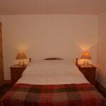 King size double bed in bedroom 1